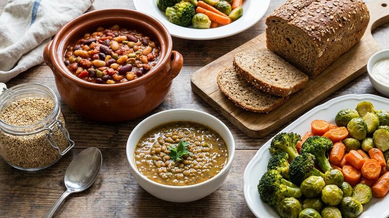 High fiber foods including beans, lentils, whole grains and vegetables